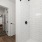 Spacious closets and en suite baths with custom tile backsplash.