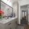 Granite countertops and custom cabinetry in baths.