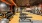 24-hour Fitness studio with weight benches and free weights