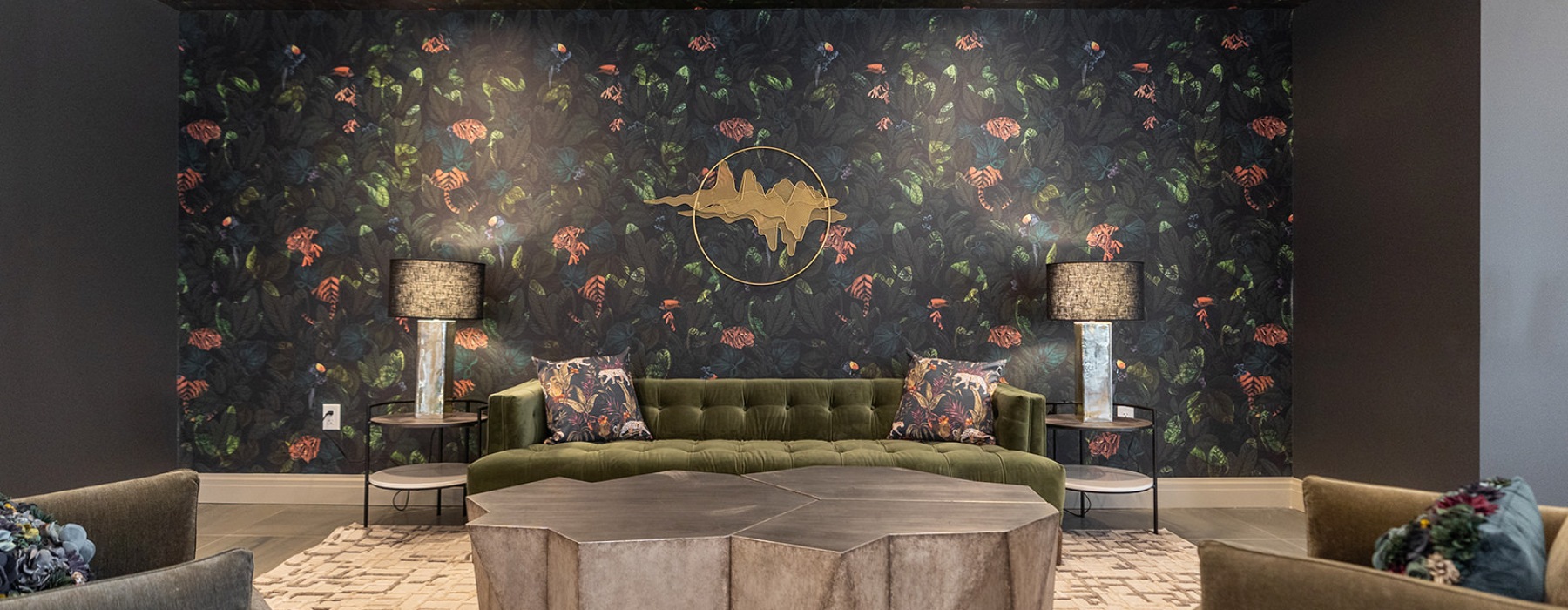 lounge with large coffee table and black wallpaper